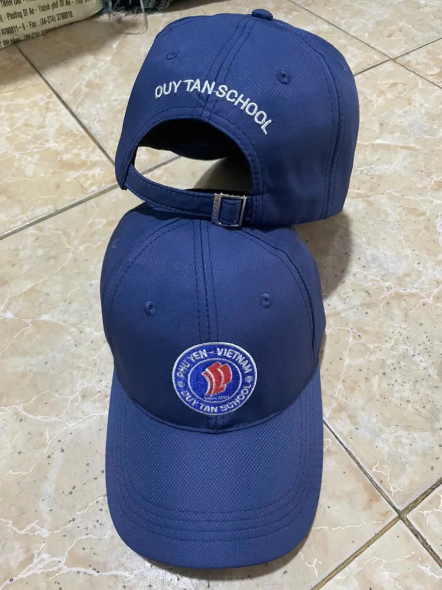 Nón kết (mũ lưỡi trai) đồng phục màu xanh navy dành cho học sinh, thêu logo trường học mặt trước
